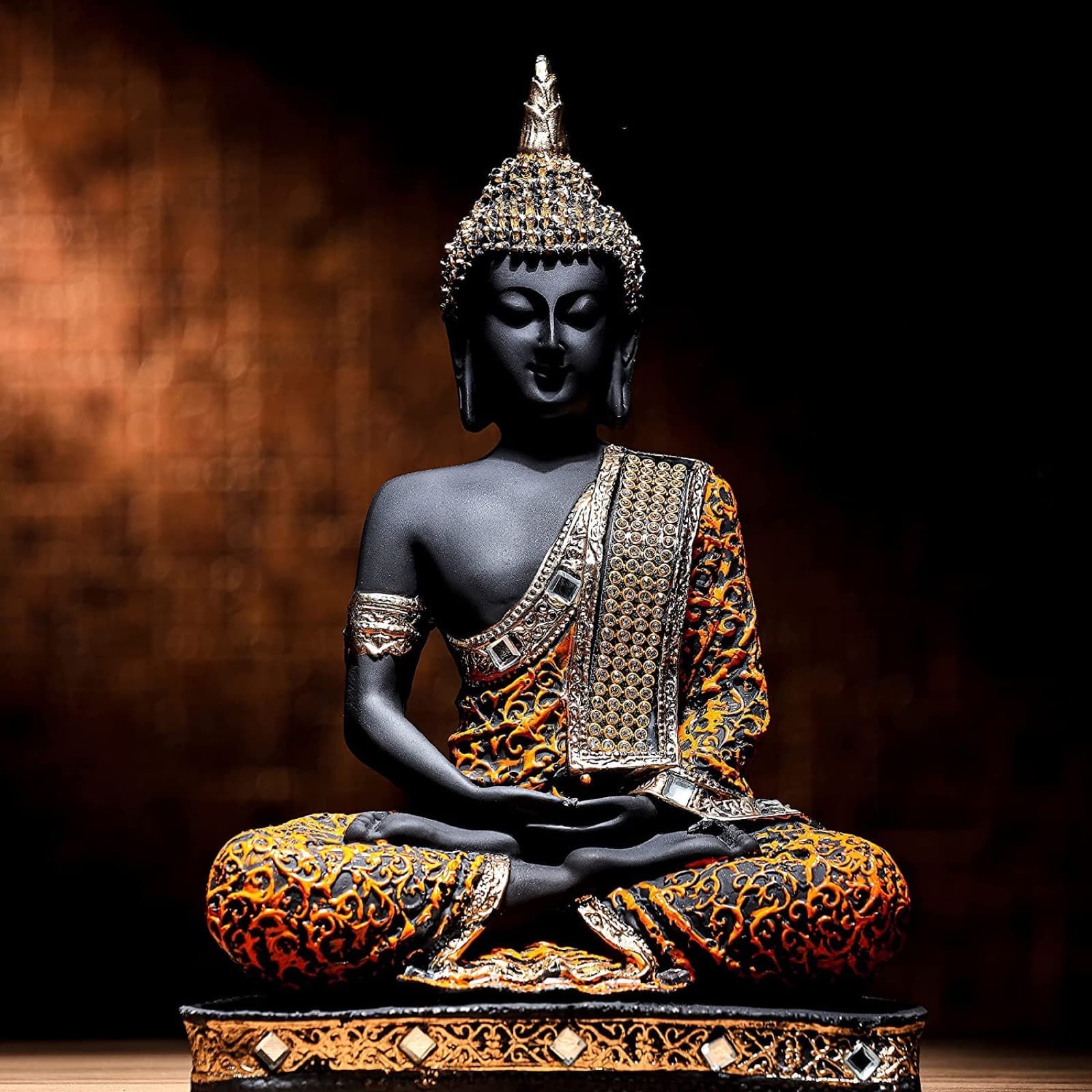Gold Buddha statue in abhaya mudra